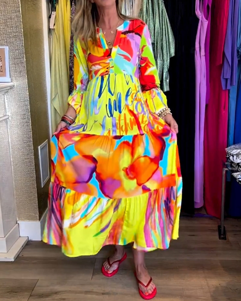 Gele jurk met uitlopende mouwen en print elegant