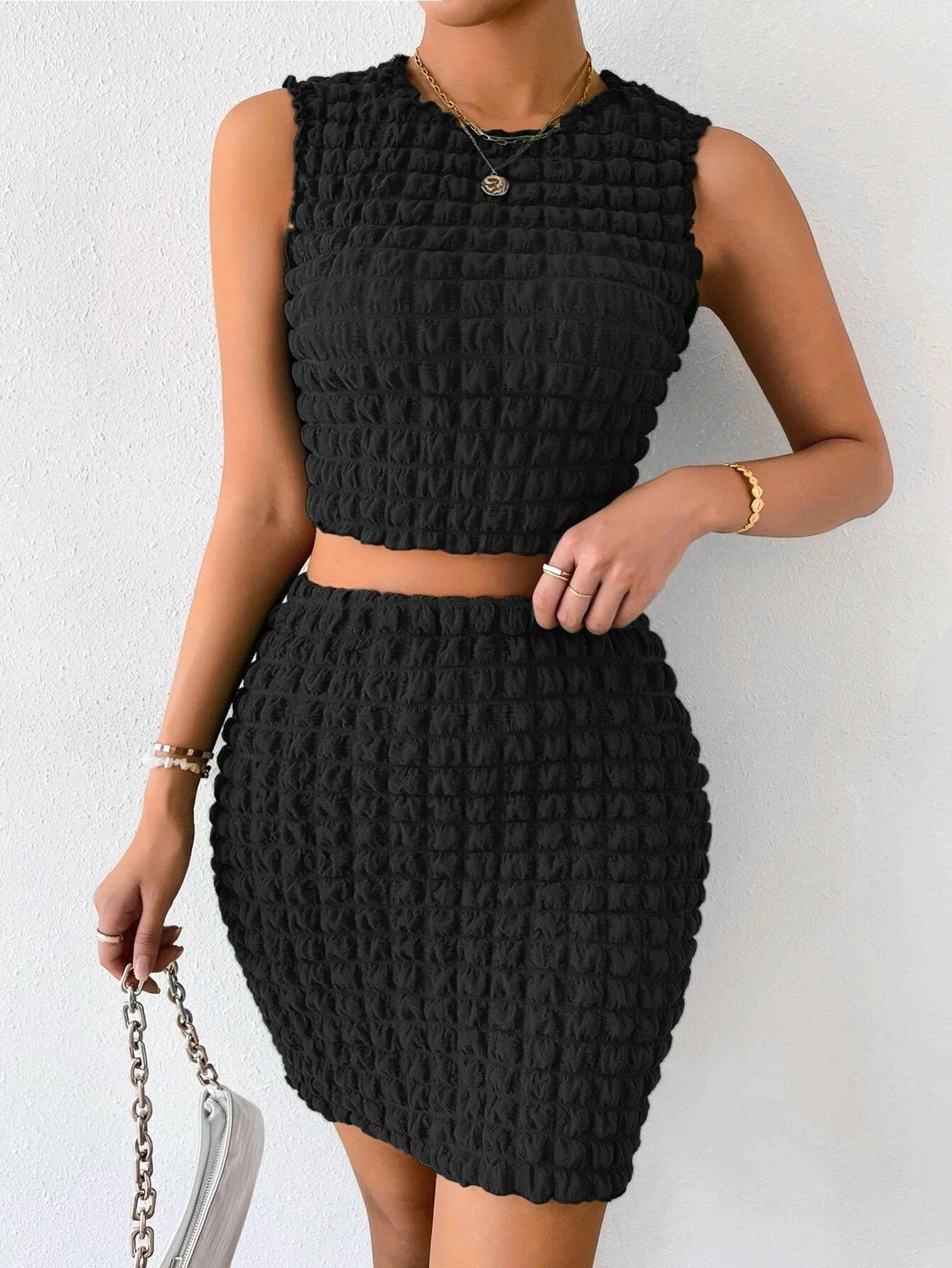 DARINKA | Bubble-textuur crop top & high-waisted rok set