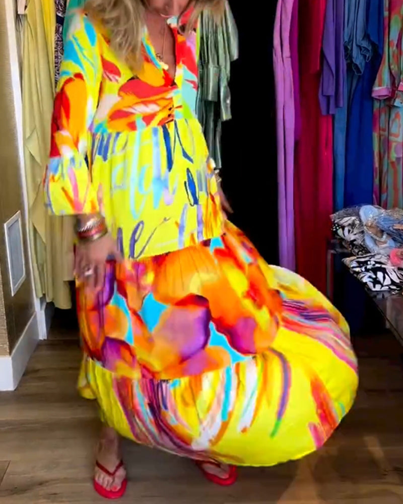 Gele jurk met uitlopende mouwen en print elegant