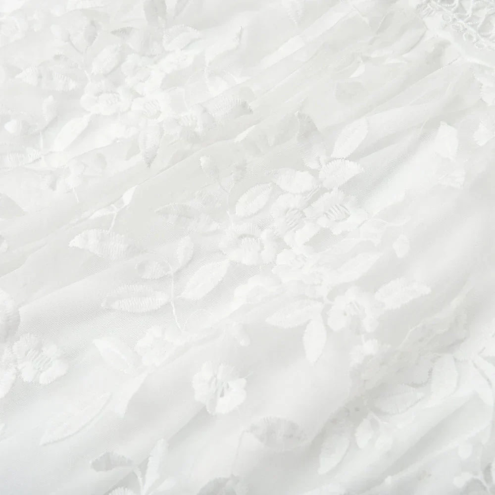 FIORELLA | Witte kanten jurk met bloemenborduursels