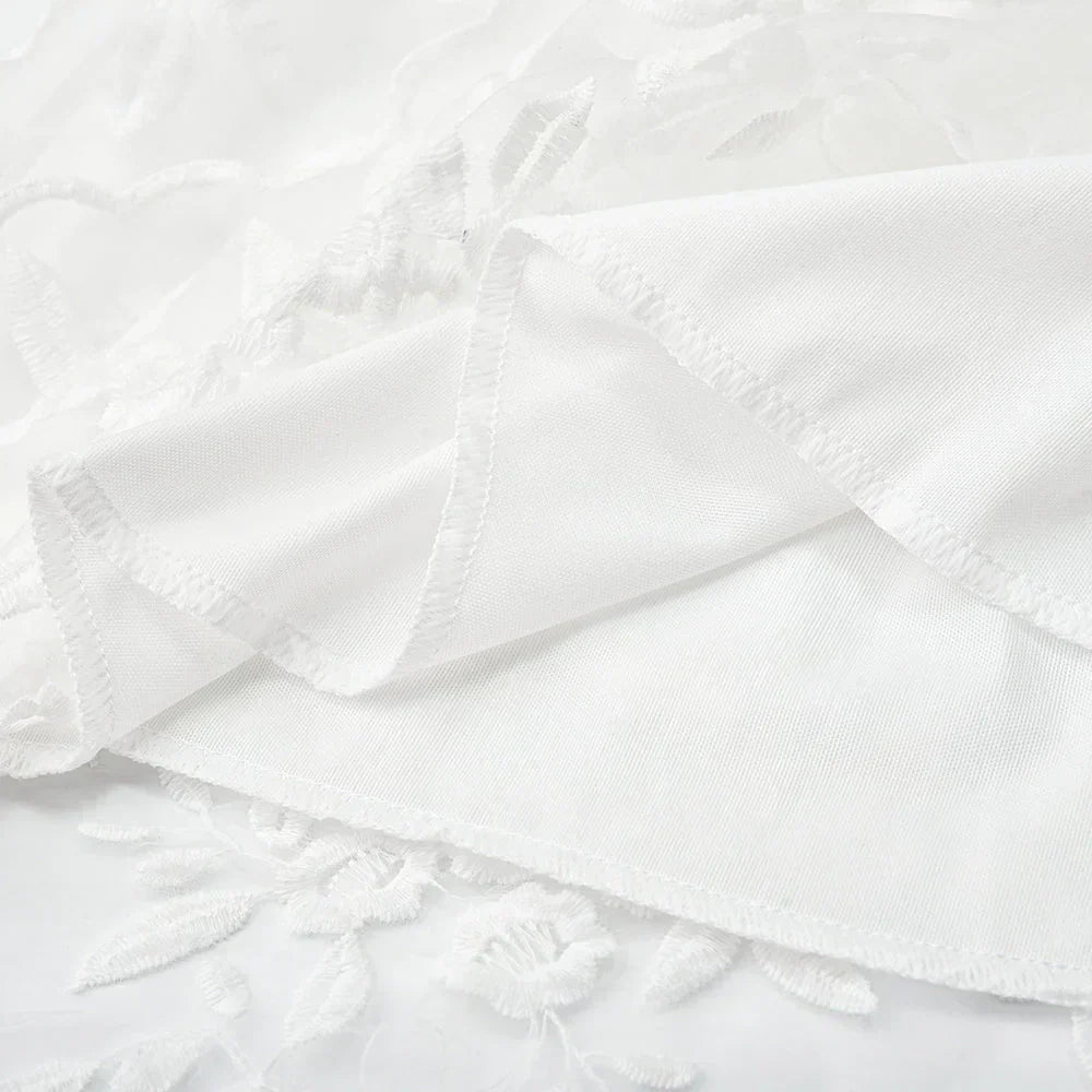 FIORELLA | Witte kanten jurk met bloemenborduursels