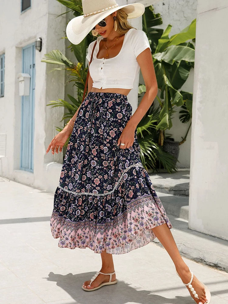 LIORA | Midi-rok met retroprint en speelse ruches
