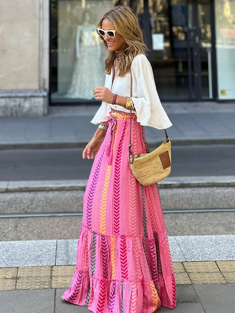 LIORA | Midi-rok met retroprint en speelse ruches