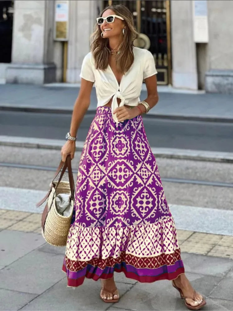 LIORA | Midi-rok met retroprint en speelse ruches