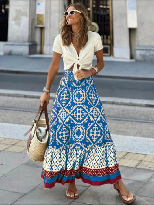 LIORA | Midi-rok met retroprint en speelse ruches