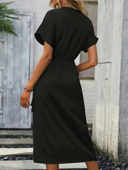 ALISSIA | Elegante wikkeljurk met verfijnde details