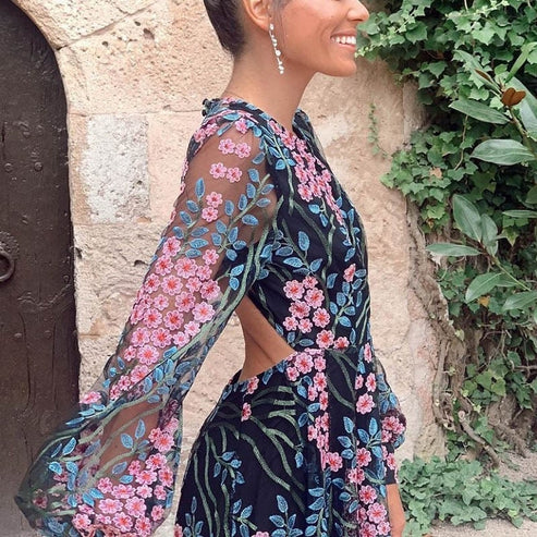 ALMIRA | Zomerse maxi-jurk met bloemenprint en open rug 0
