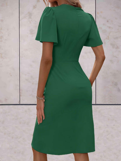 Elegante Wikkeljurk met Zwierige Mouwen | Slim Fit Cocktailjurk