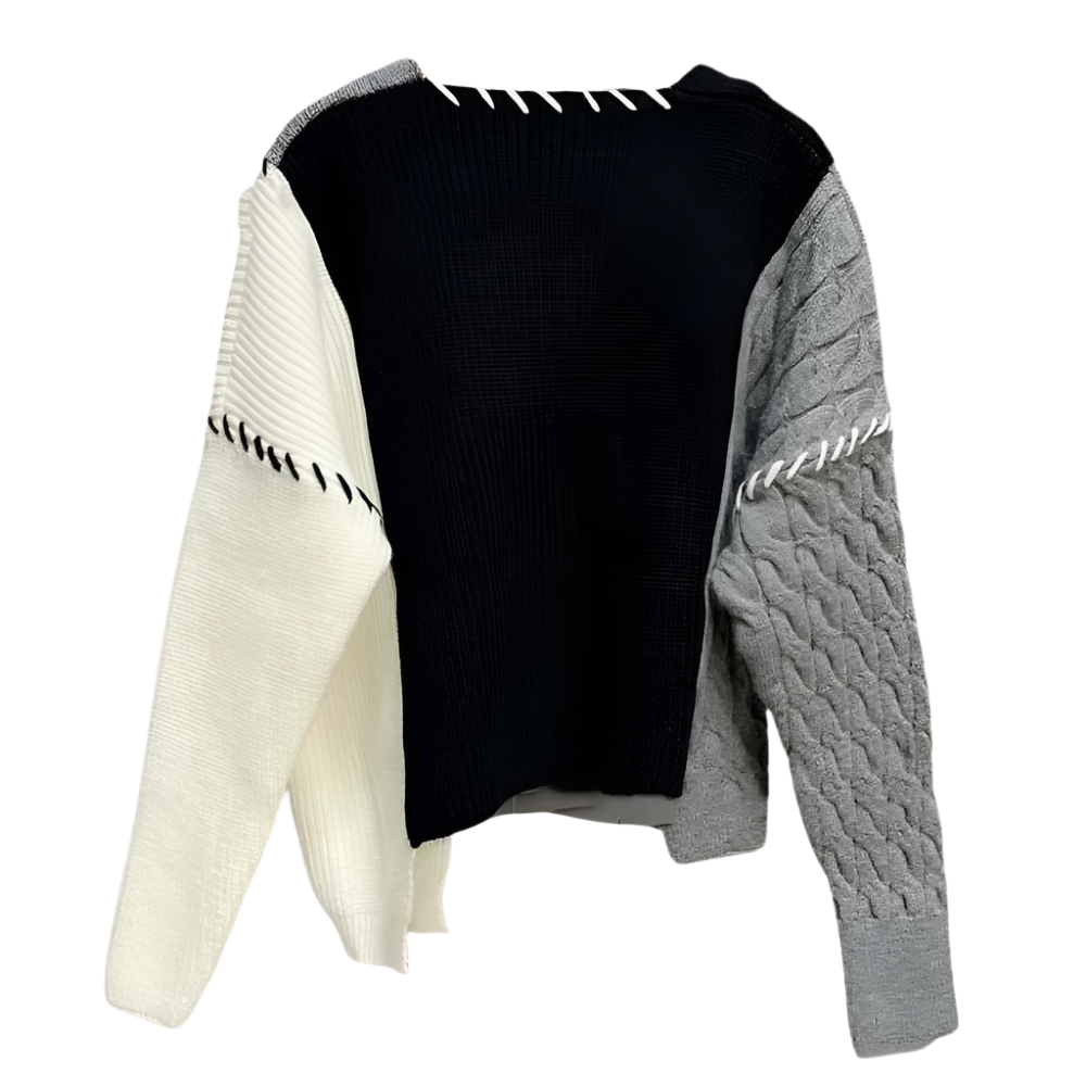 PIXIE | Asymmetrisch vest met hartapplicatie en kleuraccenten