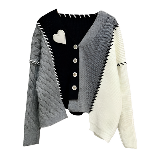 PIXIE | Asymmetrisch vest met hartapplicatie en kleuraccenten