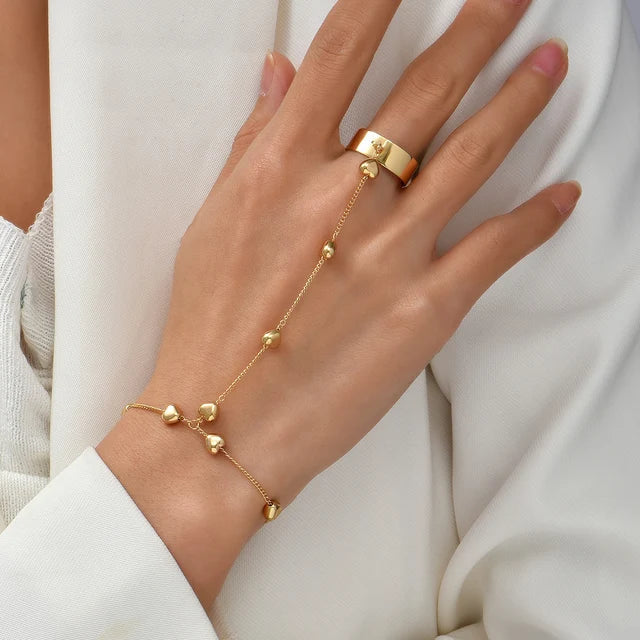 Ayanna | Goudkleurige Sieradenset met Handharnasdetail