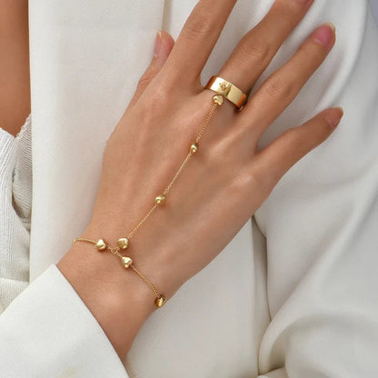Ayanna | Goudkleurige Sieradenset met Handharnasdetail