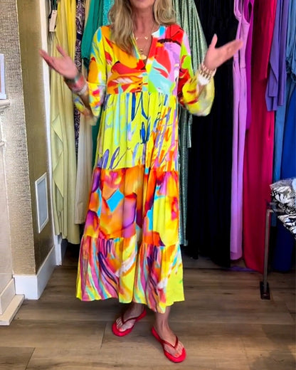 Gele jurk met uitlopende mouwen en print elegant 0