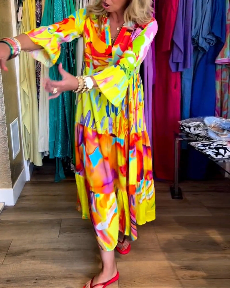Gele jurk met uitlopende mouwen en print elegant 1