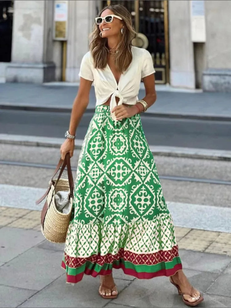LIORA | Midi-rok met retroprint en speelse ruches 0
