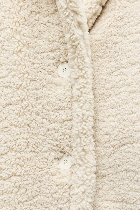 Lange Winterjas Dames van Zachte Teddy Stof met Reverskraag en Steekzakken voor Extra Warmte en Comfort
