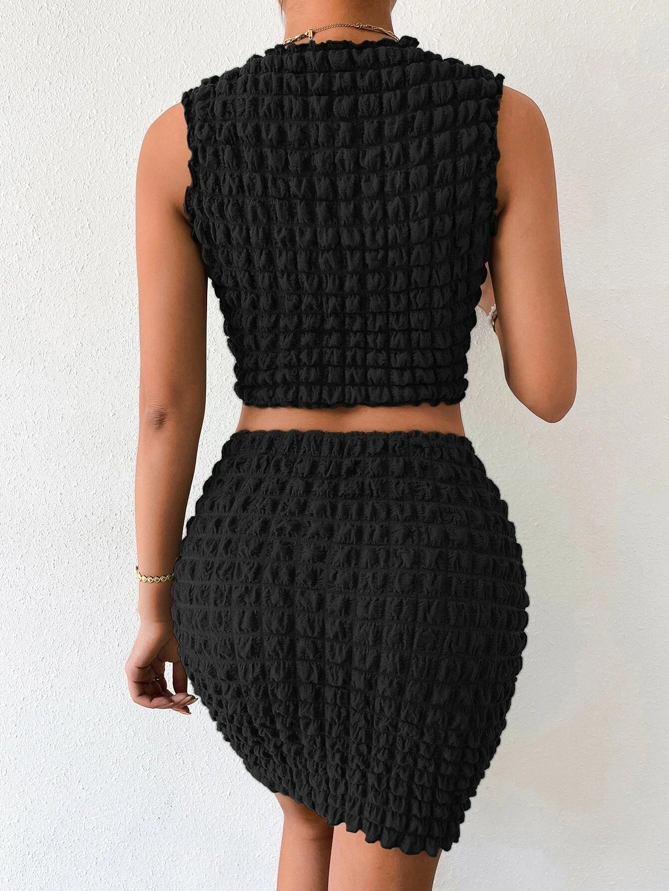 DARINKA | Bubble-textuur crop top & high-waisted rok set