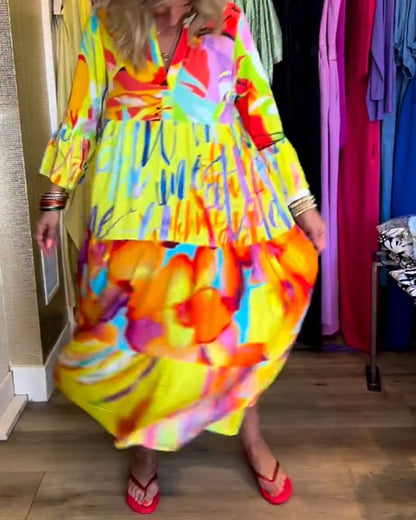 Gele jurk met uitlopende mouwen en print elegant