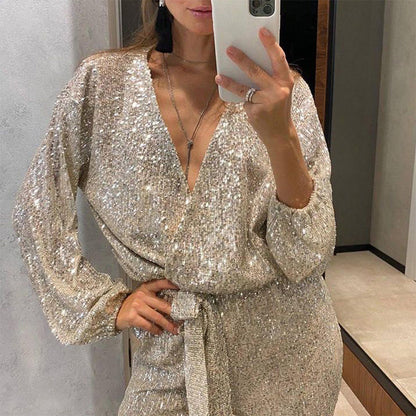 CELINNE | Glitterende Jumpsuit met V-hals en Elegante Tailleriem